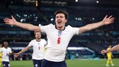 Harry Maguire phấn khích khi ghi bàn trong trận thắng Ukraine 4-0 ở tứ kết. Ảnh: Getty Images