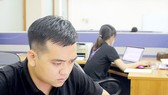Nguyễn Xuân Bằng tại văn phòng làm việc