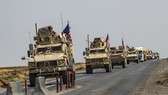 Đoàn xe quân sự Mỹ từ miền Bắc Iraq di chuyển qua thành phố Qamishli, miền Đông Bắc Syria ngày 26-10-2019. Nguồn: TTXVN