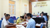 Hoạt động tiếp dân, giải quyết thủ tục hành chính tại “văn phòng 1 cửa” xã Tân Bình, huyện Đầm Hà, tỉnh Quảng Ninh. Ảnh: QUANG PHÚC