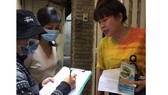 Cán bộ vận động người dân trên địa bàn quận 1, TPHCM tham gia BHXH tự nguyện, BHYT