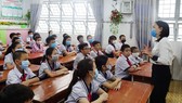 Học sinh khối 5, Trường Tiểu học An Hội (quận Gò Vấp) trong ngày đầu tiên trở lại trường sau hơn 3 tháng nghỉ học vì dịch bệnh