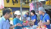 Bán hàng lưu động Co.opmart Ảnh: CAO THĂNG