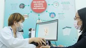 Tiếp nhận thông tin và chẩn đoán bệnh tại Bệnh viện Miền Đông, quận 9, TPHCM. Ảnh: HOÀNG HÙNG