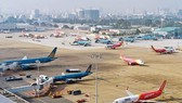 Vé máy bay “cõng” thêm 90.000-100.000 đồng phí quản trị hệ thống
