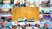 Phó Thủ tướng Vũ Đức Đam làm việc trực tuyến với TPHCM, các tỉnh ĐBSCL và Tây Nguyên về chuẩn bị nới lỏng giãn cách xã hội sau ngày 30-9. Ảnh: TTXVN