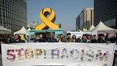 This file photo, taken on March 21, 2016, shows members of a rights groups for migrant workers calling for an end to racism to mark International Day for the Elimination of Racial Discrimination in downtown Seoul. (Yonhap)