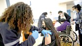 Israel thành công với chiến dịch tiêm vaccine Covid-19 nhanh nhất thế giới. Ảnh: Reuters
