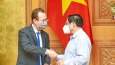 Thủ tướng Phạm Minh Chính tiếp ông Christopher Klein, Đại biện lâm thời Đại sứ quán Hoa Kỳ. Ảnh: VIẾT CHUNG