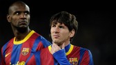 Eric Abidal và Lionel Messi