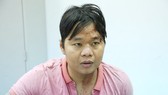 Đối tượng Nguyễn Thanh Hùng tại cơ quan công an