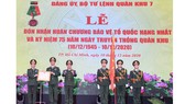 Quân khu 7 đón nhận Huân chương bảo vệ Tổ quốc hạng Nhất. Ảnh: VIỆT DŨNG