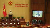 Cuối buổi sáng 25-3, Quốc hội nghe Tổng Thư ký Quốc hội Nguyễn Hạnh Phúc, Chánh Văn phòng Hội đồng bầu cử quốc gia trình bày báo cáo về công tác chuẩn bị bầu cử. Ảnh: QUANG PHÚC