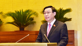 Chủ tịch Quốc hội Vương Đình Huệ bày tỏ sự trân trọng và cảm động trước những nỗ lực của nhiều thương binh, bệnh binh, gia đình liệt sĩ và người có công đã khắc phục khó khăn, tự vươn lên, xây dựng cuộc sống. Ảnh: QUANG PHÚC