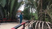 Công an phong toả hiện trường nơi vào căn nhà xảy ra vụ việc. Ảnh: CHÍ THẠCH