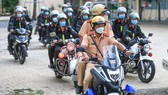 Công an TPHCM tăng cường tuần tra sau khi TP nới lỏng giãn cách. Ảnh: DŨNG PHƯƠNG