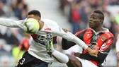 Mario Balotelli (phải) là cái cớ để thay HLV ở Nice. Ảnh Getty Images.