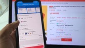 Information leaks in online purchasing is a lucrative chance for cyber criminals to steal personal information of Internet users. (Photo: SGGP)
