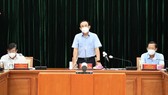 Secretary of HCMC Party Committee Nguyen Van Nen is delivering his speech in the conference. (Photo: SGGP)