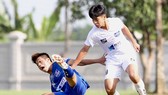 HAGL (áo xanh) bị loại ở bán kết nhưng có 11 cầu thủ được gọi tập trung