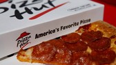 Tesco và Pizza Hut vi phạm chính sách tiền lương tối thiểu