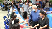 Người dân huyện Củ Chi TPHCM đi bỏ phiếu, sáng 23-5-2021. Ảnh: VIỆT DŨNG