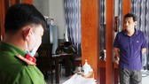 Cơ quan công an đọc lệnh bắt bị can để tạm giam đối với Bùi Quốc Việt