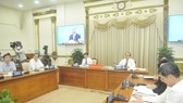 City's leaders participate in the online meeting chaired by PM Nguyen Xuan Phuc on May 9. (Photo: SGGP)