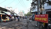 An area in Go Vap district where self-organised markets and street vendors are forbidden. Districts in HCM City are considering fixed spaces for street vendors to work. (Photo: sggp.org.vn)