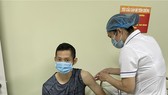 Tay vợt cầu lông Nguyễn Tiến Minh đã hoàn tất tiêm vaccine