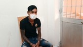 Đối tượng Nguyễn Hoàng Sơn tại cơ quan Công an. Ảnh: HẢI LINH