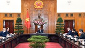 Thủ tướng Phạm Minh Chính  tiếp Đại sứ Liên bang Nga tại Việt Nam Bezdetko tới chào xã giao. Ảnh: VIẾT CHUNG