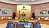 Thủ tướng Phạm Minh Chính, Trưởng Ban Chỉ đạo Quốc gia phòng, chống dịch Covid-19 chủ trì cuộc họp. Ảnh: VIẾT CHUNG