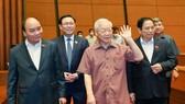 Tổng Bí thư Nguyễn Phú Trọng, Chủ tịch nước Nguyễn Xuân Phúc, Thủ tướng Phạm Minh Chính, Chủ tịch Quốc hội Vương Đình Huệ dự phiên họp Quốc hội ngày 26-5. Ảnh: QUANG PHÚC