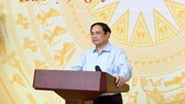 Thủ tướng Chính phủ Phạm Minh Chính chủ trì và phát biểu tại phiên họp thứ ba của Ủy ban Quốc gia về chuyển đổi số, sáng 8-8. Ảnh: VIẾT CHUNG