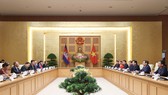 Thủ tướng Phạm Minh Chính tiếp Chủ tịch Quốc hội Vương quốc Campuchia Samdech Heng Samrin đang thăm chính thức Việt Nam, chiều 13-9. Ảnh: VIẾT CHUNG