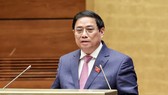 Thủ tướng Chính phủ Phạm Minh Chính trình bày báo cáo. Ảnh: QUANG PHÚC