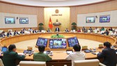 Thủ tướng Phạm Minh Chính chủ trì hội nghị trực tuyến toàn quốc về công tác truyền thông chính sách. Ảnh: VIẾT CHUNG