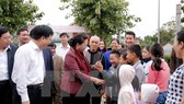 National Assembly Chairwoman Nguyen Thi Kim Ngan and residents in Sen 3 hamlet, Kim Lien commune, Nam Dan district, central Nghe An province (Source: VNA)