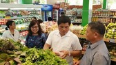 At a Co.op Food franchisee in HCM City. Vietnam offers huge opportunities for convenience store franchisers. — Photo courtesy of Saigon Co.op