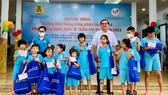 Orphans, disabled kids receive scholarships on occasion of Int'l Children's Day