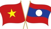 Top leaders congratulate Laos on National Day