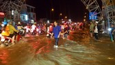 High tide inundated roads of Can Tho city