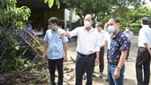 City leader checks works against Covid-19, dengue fever in District 4