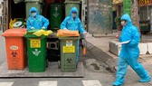 Thu gom rác thải đã phân loại tại quận 5. Ảnh: CAO THĂNG