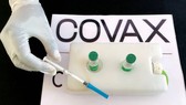 Một y tá chuẩn bị tiêm vaccine AstraZeneca/Oxford theo chương trình COVAX phòng chống bệnh Covid-19 tại Bệnh viện Đa khoa Eka Kotebe, ở ​​Addis Ababa, Ethiopia, ngày 13-3-2021. Ảnh: REUTERS