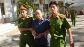 Ông Nguyễn Hữu Hoành, nguyên Phó Giám đốc Chi nhánh Văn phòng Đăng ký đất đai TP Phan Thiết bị khởi tố, bắt tạm giam hôm 7-1.