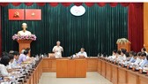 Mr. Tran Quoc Vuong, Politburo member and permanent member of the Communist Party of Vietnam (CPV) Central Committee's Secretariat delivers a speech at the working session with HCMC Party Committee on May 4 (Photo: SGGP)