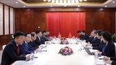 At the meeting between Vietnamese Deputy Prime Minister and Foreign Minister Pham Binh Minh and Chinese State Councilor and Foreign Minister Wang Yi (Photo: VNA)