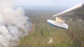 Đám cháy rừng đang ngày càng lan rộng ở vùng Siberia. Ảnh: AP